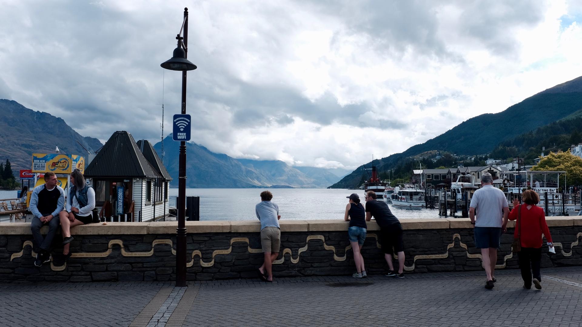 Queenstown bay with mountains in the distance.